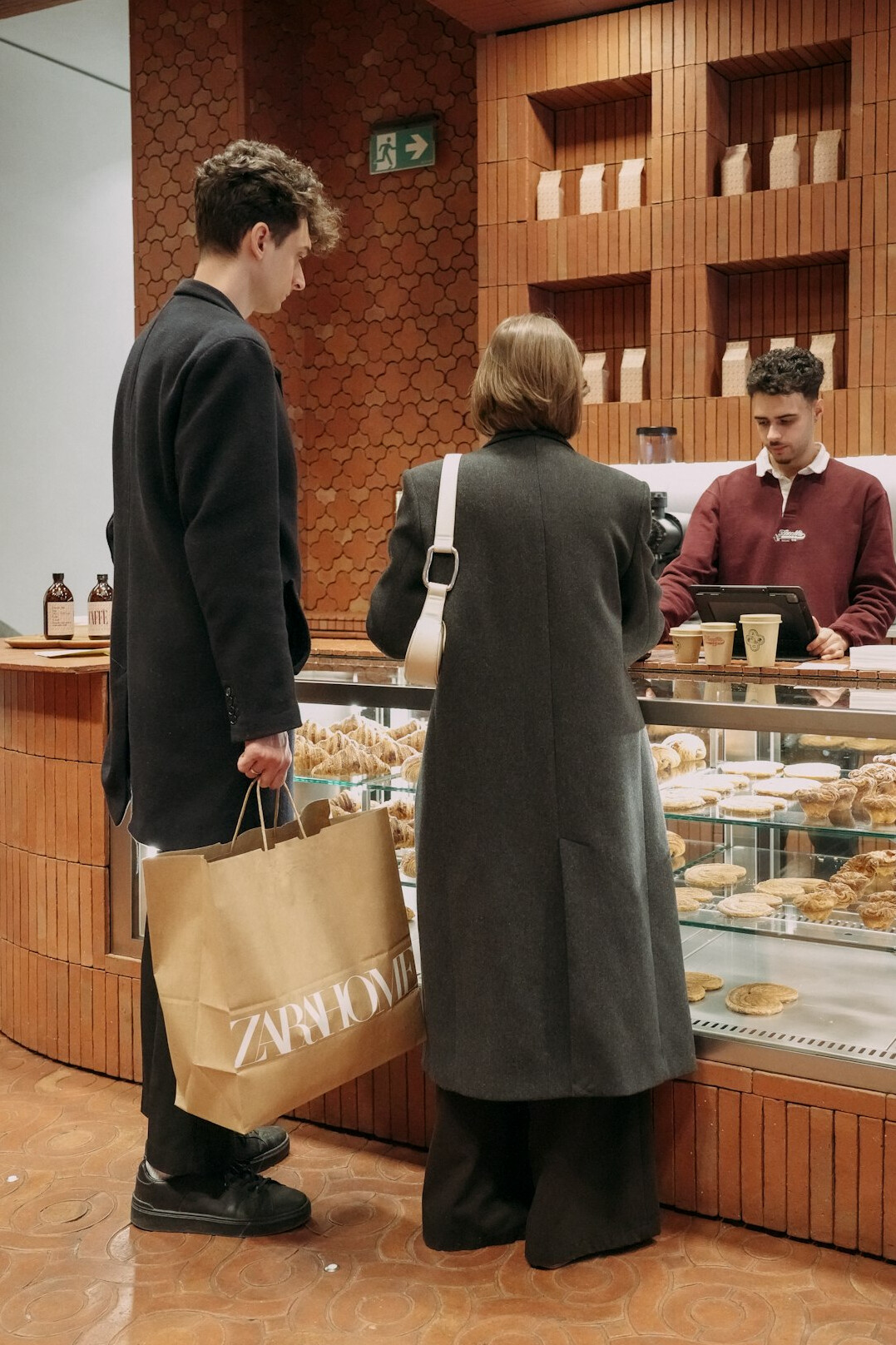store detective watching shopper